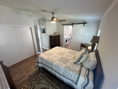 A beautiful remodeled home done in 2022! As you arrive at the on Del Tura Golf and Country Club in Florida - for sale on GolfHomes.com, golf home, golf lot