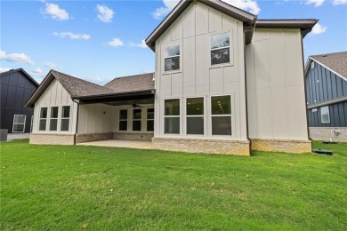 Discover this brand-new home situated adjacent to the golf on Big Sugar Golf Club in Arkansas - for sale on GolfHomes.com, golf home, golf lot