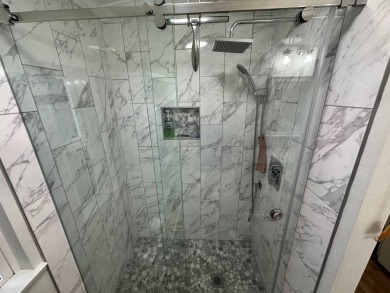 A beautiful remodeled home done in 2022! As you arrive at the on Del Tura Golf and Country Club in Florida - for sale on GolfHomes.com, golf home, golf lot
