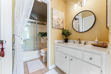Welcome to this exquisite two-bedroom upstairs, end-unit in the on Tustin Ranch Golf Club in California - for sale on GolfHomes.com, golf home, golf lot