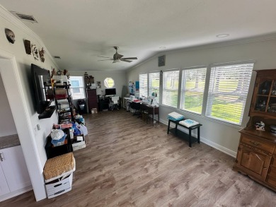 A beautiful remodeled home done in 2022! As you arrive at the on Del Tura Golf and Country Club in Florida - for sale on GolfHomes.com, golf home, golf lot