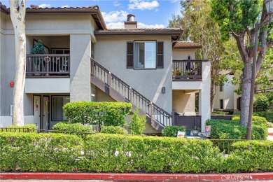 Welcome to this exquisite two-bedroom upstairs, end-unit in the on Tustin Ranch Golf Club in California - for sale on GolfHomes.com, golf home, golf lot