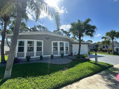 A beautiful remodeled home done in 2022! As you arrive at the on Del Tura Golf and Country Club in Florida - for sale on GolfHomes.com, golf home, golf lot