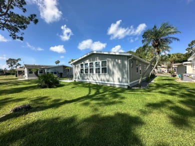 A beautiful remodeled home done in 2022! As you arrive at the on Del Tura Golf and Country Club in Florida - for sale on GolfHomes.com, golf home, golf lot
