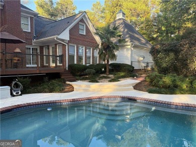 Welcome to Your Perfect Retreat in Snellville, Gwinnett County on Country Club of Gwinnett in Georgia - for sale on GolfHomes.com, golf home, golf lot