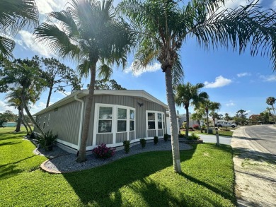 A beautiful remodeled home done in 2022! As you arrive at the on Del Tura Golf and Country Club in Florida - for sale on GolfHomes.com, golf home, golf lot