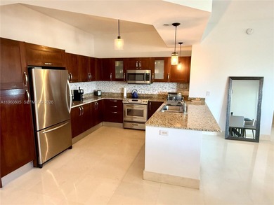 Beautifully appointed 3-bedroom, 3-bath Tower Suite in Turnberry on Turnberry Isle Resort and Club in Florida - for sale on GolfHomes.com, golf home, golf lot