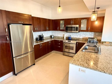 Beautifully appointed 3-bedroom, 3-bath Tower Suite in Turnberry on Turnberry Isle Resort and Club in Florida - for sale on GolfHomes.com, golf home, golf lot