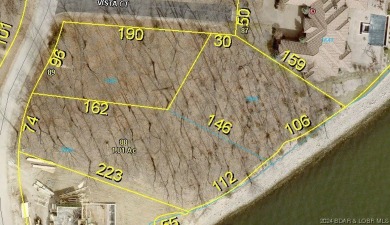 ONE OF THE *LARGEST* AND MOST DESIRABLE BUILDING SITE LOCATIONS on The Club At Porto Cima in Missouri - for sale on GolfHomes.com, golf home, golf lot