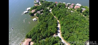 ONE OF THE *LARGEST* AND MOST DESIRABLE BUILDING SITE LOCATIONS on The Club At Porto Cima in Missouri - for sale on GolfHomes.com, golf home, golf lot
