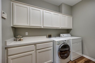 Nestled in the heart of Coppell, this beautifully renovated on Riverchase Golf Club in Texas - for sale on GolfHomes.com, golf home, golf lot