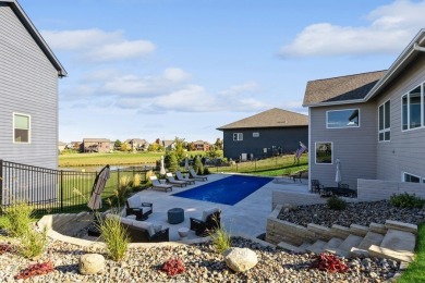 Nestled in the heart of the prestigious Otter Creek Golf Course on Otter Creek Golf Course in Iowa - for sale on GolfHomes.com, golf home, golf lot