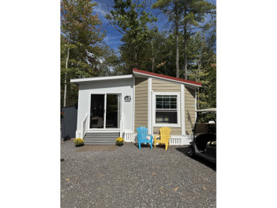 Welcome to your serene escape at Point Sebago. This 2-bedroom on Point Sebago Golf/Beach Resort in Maine - for sale on GolfHomes.com, golf home, golf lot