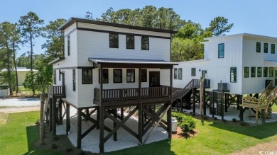Welcome to your Low Country dream coastal-modern retreat! on True Blue Plantation in South Carolina - for sale on GolfHomes.com, golf home, golf lot