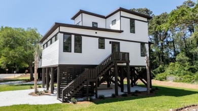 Welcome to your Low Country dream coastal-modern retreat! on True Blue Plantation in South Carolina - for sale on GolfHomes.com, golf home, golf lot