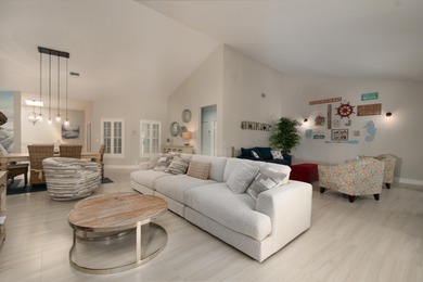 Located in the secure, guard gated community of Indian Springs on Indian Spring Golf and Country Club in Florida - for sale on GolfHomes.com, golf home, golf lot