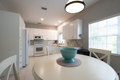 Located in the secure, guard gated community of Indian Springs on Indian Spring Golf and Country Club in Florida - for sale on GolfHomes.com, golf home, golf lot