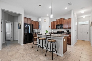 LOVE WHERE YOU LIVE! This turnkey 3-bedroom, 2-bath home offers on The Groves Golf and Country Club in Florida - for sale on GolfHomes.com, golf home, golf lot
