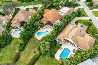 Amazing and stunning lake, pool and garden views are enjoyed on Frenchmans Creek Country Club in Florida - for sale on GolfHomes.com, golf home, golf lot