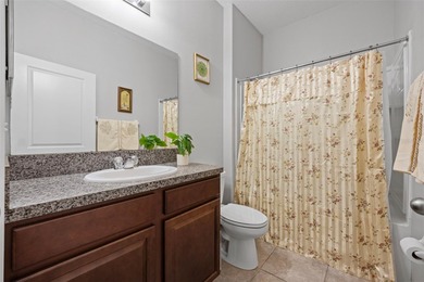 LOVE WHERE YOU LIVE! This turnkey 3-bedroom, 2-bath home offers on The Groves Golf and Country Club in Florida - for sale on GolfHomes.com, golf home, golf lot