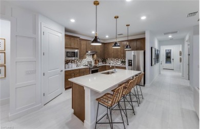 This Mystique floorplan offers 2 bedrooms, 2 bathrooms, a on Panther Run Golf Club in Florida - for sale on GolfHomes.com, golf home, golf lot
