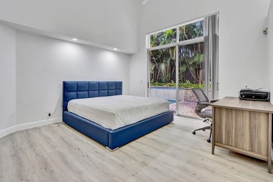 GREAT VALUE!  This light & open 2-story home of 3 bedrooms & 2 on Woodfield Country Club in Florida - for sale on GolfHomes.com, golf home, golf lot