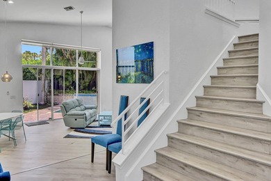 GREAT VALUE!  This light & open 2-story home of 3 bedrooms & 2 on Woodfield Country Club in Florida - for sale on GolfHomes.com, golf home, golf lot