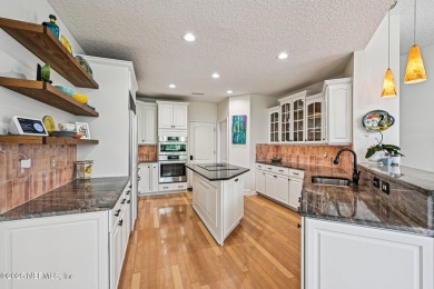 Experience unmatched luxury in this breathtaking waterfront on Eagle Harbor Golf Club in Florida - for sale on GolfHomes.com, golf home, golf lot