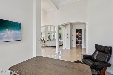 Experience unmatched luxury in this breathtaking waterfront on Eagle Harbor Golf Club in Florida - for sale on GolfHomes.com, golf home, golf lot