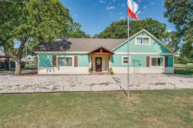 Charming 4-bedroom, 3-bath home in the gated Lake Kiowa on Lake Kiowa Golf Course in Texas - for sale on GolfHomes.com, golf home, golf lot
