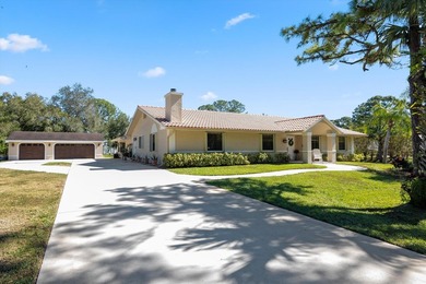 Live the lifestyle you've been dreaming of in this impressive on Jupiter Country Club in Florida - for sale on GolfHomes.com, golf home, golf lot