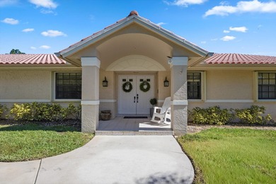 Live the lifestyle you've been dreaming of in this impressive on Jupiter Country Club in Florida - for sale on GolfHomes.com, golf home, golf lot