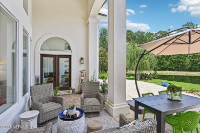 Experience unmatched luxury in this breathtaking waterfront on Eagle Harbor Golf Club in Florida - for sale on GolfHomes.com, golf home, golf lot