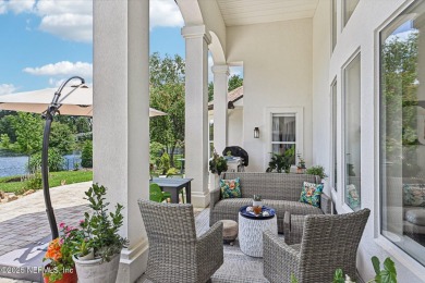 Experience unmatched luxury in this breathtaking waterfront on Eagle Harbor Golf Club in Florida - for sale on GolfHomes.com, golf home, golf lot