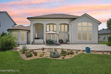 Experience unmatched luxury in this breathtaking waterfront on Eagle Harbor Golf Club in Florida - for sale on GolfHomes.com, golf home, golf lot