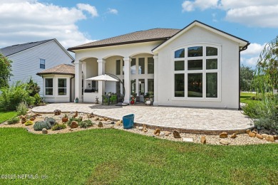 Experience unmatched luxury in this breathtaking waterfront on Eagle Harbor Golf Club in Florida - for sale on GolfHomes.com, golf home, golf lot
