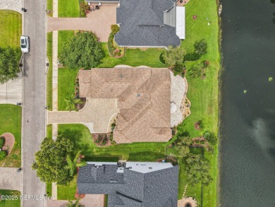 Now priced below appraised value, this breathtaking waterfront on Eagle Harbor Golf Club in Florida - for sale on GolfHomes.com, golf home, golf lot
