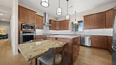 Perfectly positioned for effortless, no-step living with on Adobe Creek National Golf Course in Colorado - for sale on GolfHomes.com, golf home, golf lot