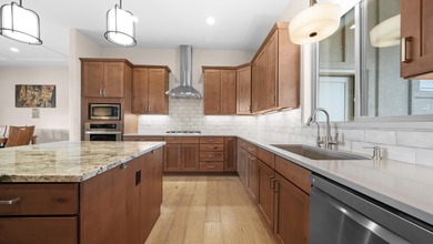 Perfectly positioned for effortless, no-step living with on Adobe Creek National Golf Course in Colorado - for sale on GolfHomes.com, golf home, golf lot