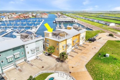 Wowza!! Fly in and enjoy your waterfront 4 story pristine, 3/3.5 on Palmilla Beach Golf Club in Texas - for sale on GolfHomes.com, golf home, golf lot