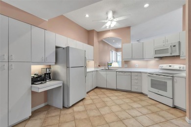 This 2 bedroom, 2 bath villa with 2 car garage offers an on TPC Prestancia in Florida - for sale on GolfHomes.com, golf home, golf lot