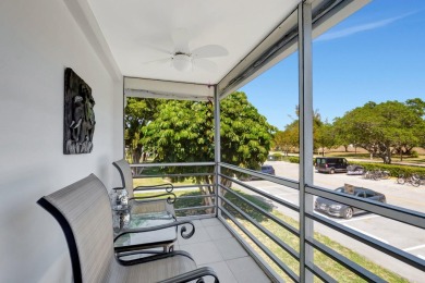 Stunning Corner Unit Condo - Fully Furnished & Move-In on Hillsboro Pines Golf in Florida - for sale on GolfHomes.com, golf home, golf lot