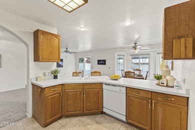 This home is designed for easy, low-maintenance living in a on Sun City Riverview Golf Course in Arizona - for sale on GolfHomes.com, golf home, golf lot