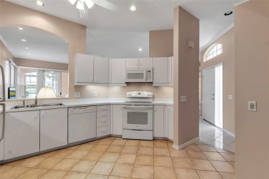 This 2 bedroom, 2 bath villa with 2 car garage offers an on TPC Prestancia in Florida - for sale on GolfHomes.com, golf home, golf lot