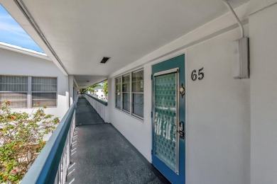 Stunning Corner Unit Condo - Fully Furnished & Move-In on Hillsboro Pines Golf in Florida - for sale on GolfHomes.com, golf home, golf lot