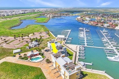 Wowza!! Fly in and enjoy your waterfront 4 story pristine, 3/3.5 on Palmilla Beach Golf Club in Texas - for sale on GolfHomes.com, golf home, golf lot