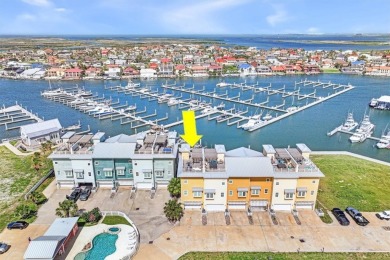 Wowza!! Fly in and enjoy your waterfront 4 story pristine, 3/3.5 on Palmilla Beach Golf Club in Texas - for sale on GolfHomes.com, golf home, golf lot