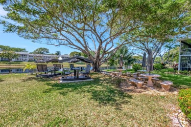 Stunning Corner Unit Condo - Fully Furnished & Move-In on Hillsboro Pines Golf in Florida - for sale on GolfHomes.com, golf home, golf lot