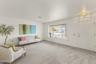 This home is designed for easy, low-maintenance living in a on Sun City Riverview Golf Course in Arizona - for sale on GolfHomes.com, golf home, golf lot