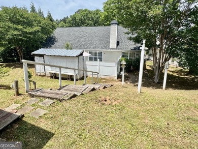 This beautifully renovated ranch-style home, located in a on Summergrove Golf Club in Georgia - for sale on GolfHomes.com, golf home, golf lot